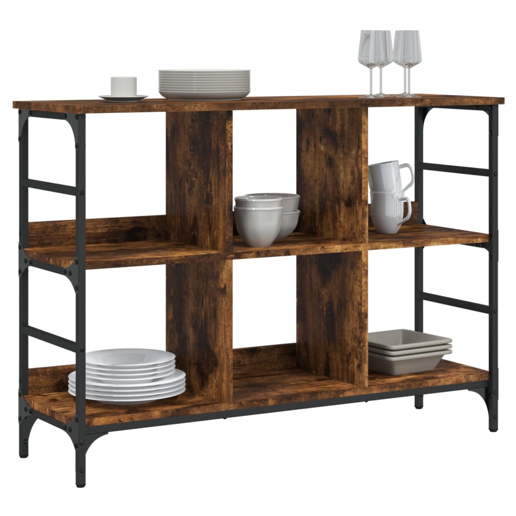 The sideboard styled with various white ceramic dishes and glassware on its open shelves