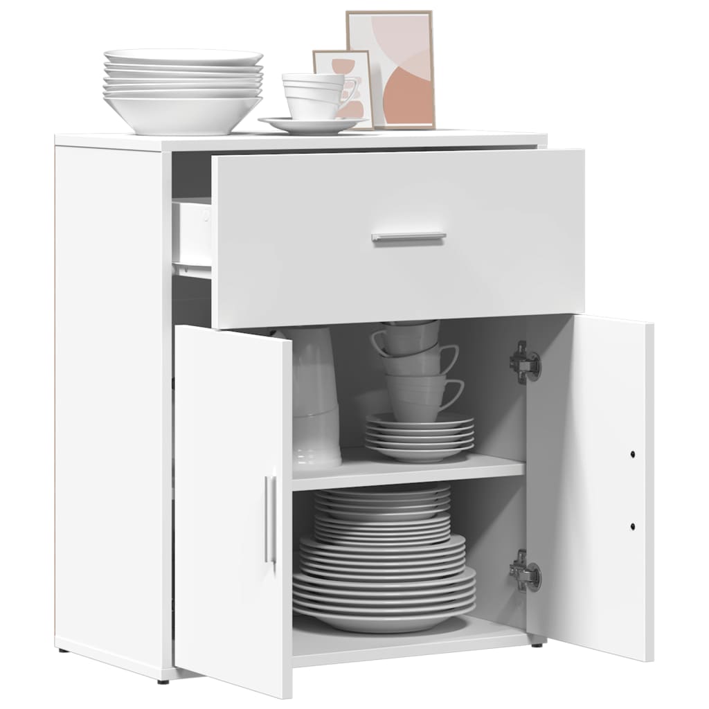 The white sideboard with its doors open showing shelves and stacked plates