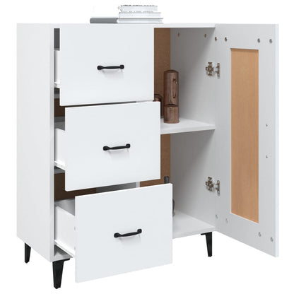 The white sideboard with three drawers extended and the door open revealing the interior