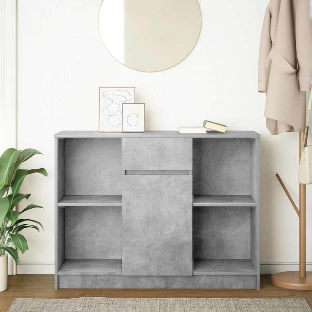 the grey sideboard with drawer in a room setting with a plant and mirror