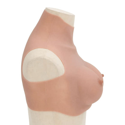 side view of the silicone breastplate showing the shape of the D cup breasts