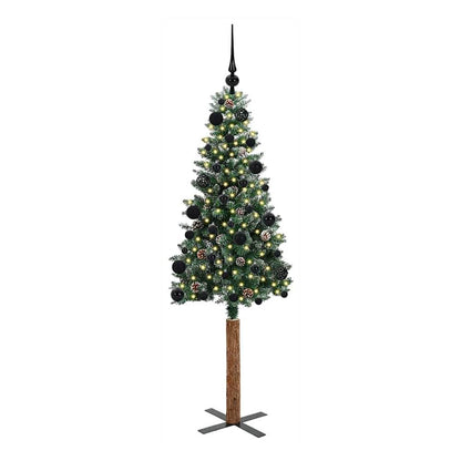 The green slim Christmas tree with a wooden base and black ornaments