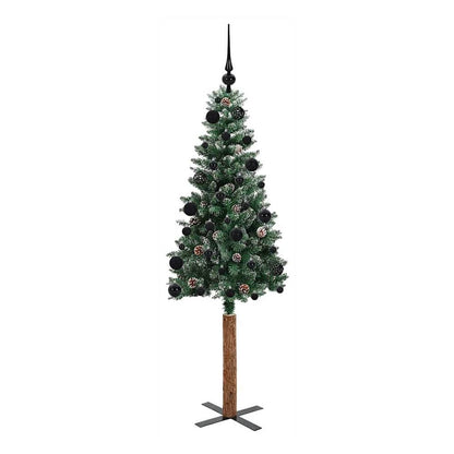 A slim green Christmas tree with a wooden stand and black decorations