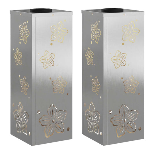 Two silver pathway lights with floral cut-out designs