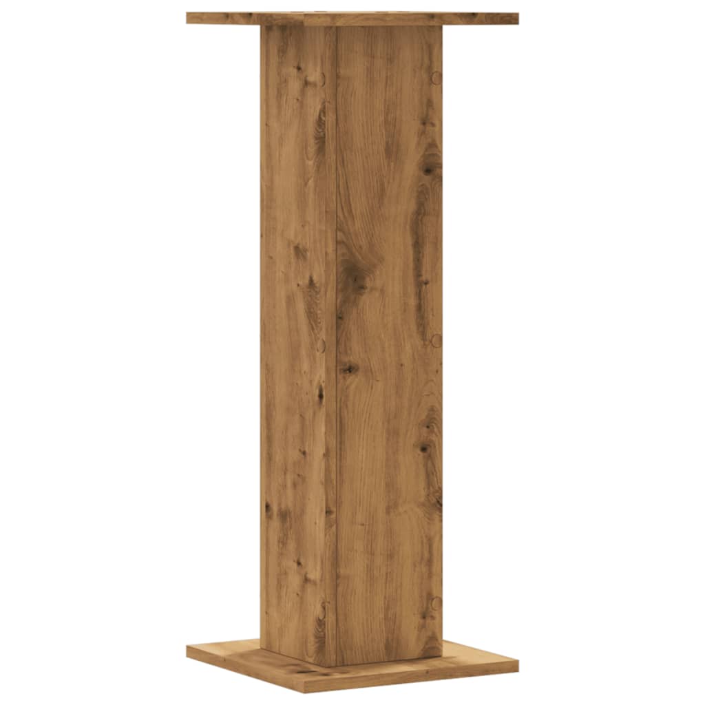 A single speaker stand with an artisan oak finish, shown from the front