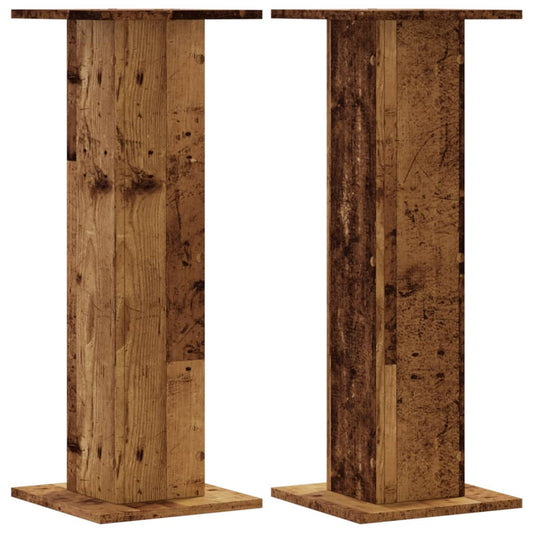 Two speaker stands with an old wood effect finish, shown side by side