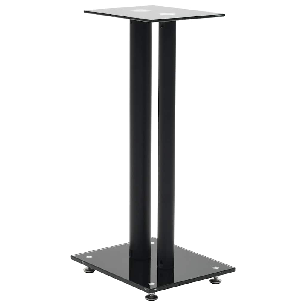 A single black speaker stand with a glass top and base