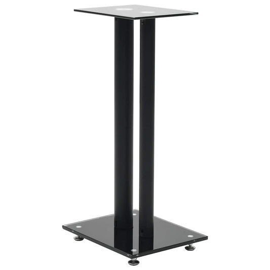 A single black speaker stand with a glass top and base