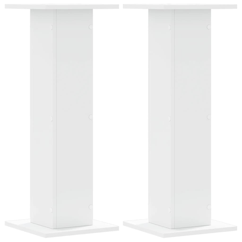 Two white speaker stands shown from the front, each with a square base and top