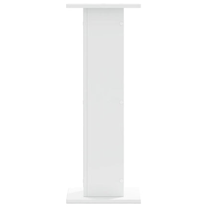 Close-up of the top corner of a white speaker stand, showing its clean edges