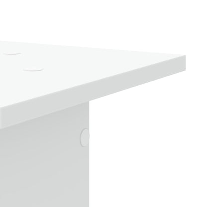 Close-up of the top surface of a white speaker stand, showing three circular indentations