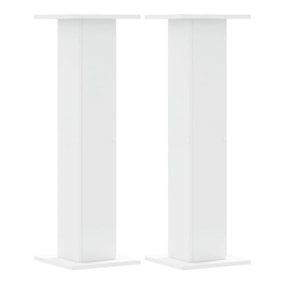 Two white speaker stands side by side on a white background