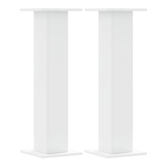 Two white speaker stands side by side on a white background