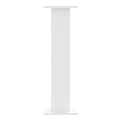 A single white speaker stand shown from the back
