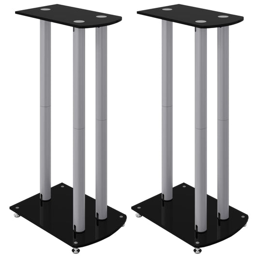 Two black and silver speaker stands with three pillars each
