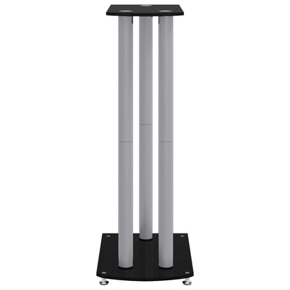A black and silver speaker stand with three pillars, rear perspective