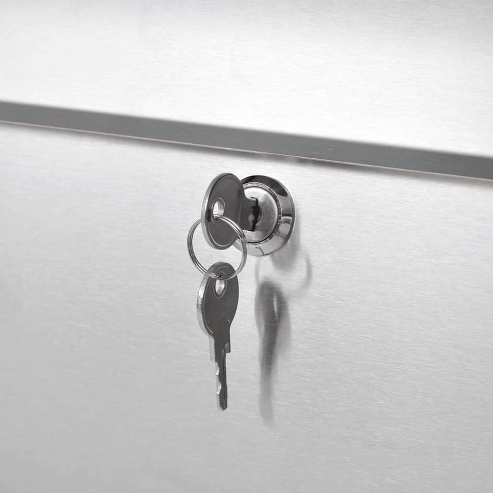 close-up of the lock and two keys on the stainless steel mailbox