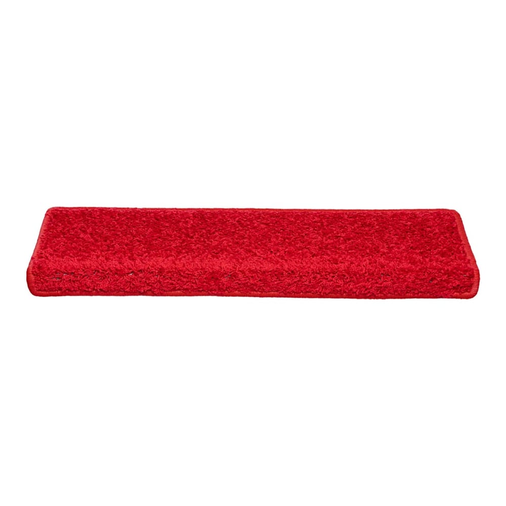A red rectangular stair tread shown from the side
