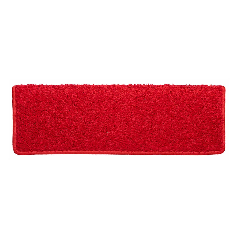 A red rectangular stair tread viewed from above