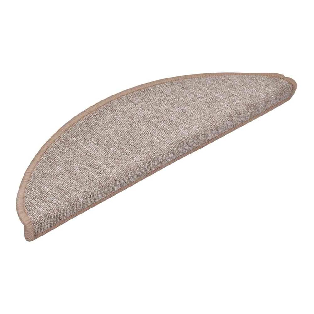 A single light brown half round stair tread with a beige trim