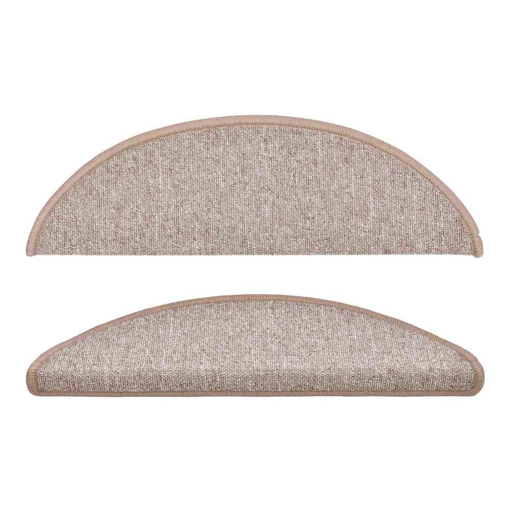 Two light brown half round stair treads with beige trim