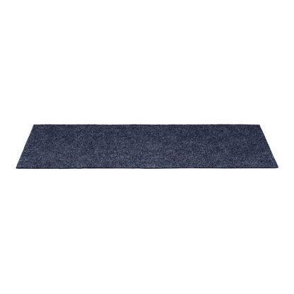 A single grey blue rectangular stair tread viewed from a low angle