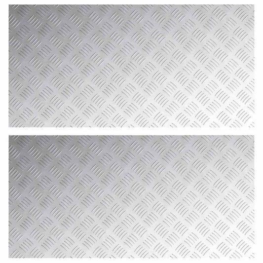 Close up of the diamond plate pattern on the aluminium stair tread