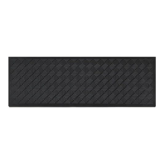 A single black rubber stair tread with a repeating square pattern