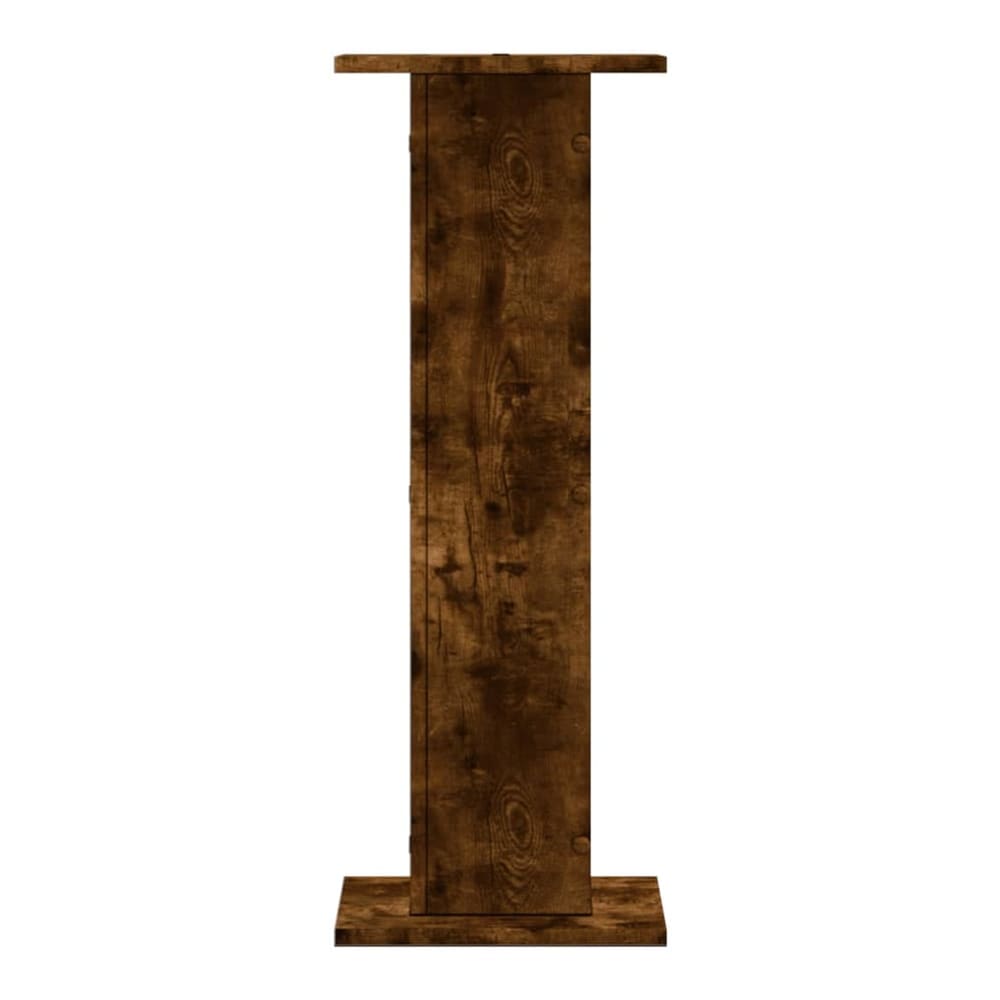 The tall plant stand viewed directly from the front showing the wood grain