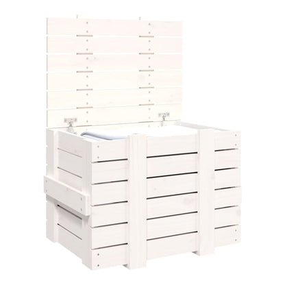 The white wooden storage chest with its lid open, revealing a folded blanket inside