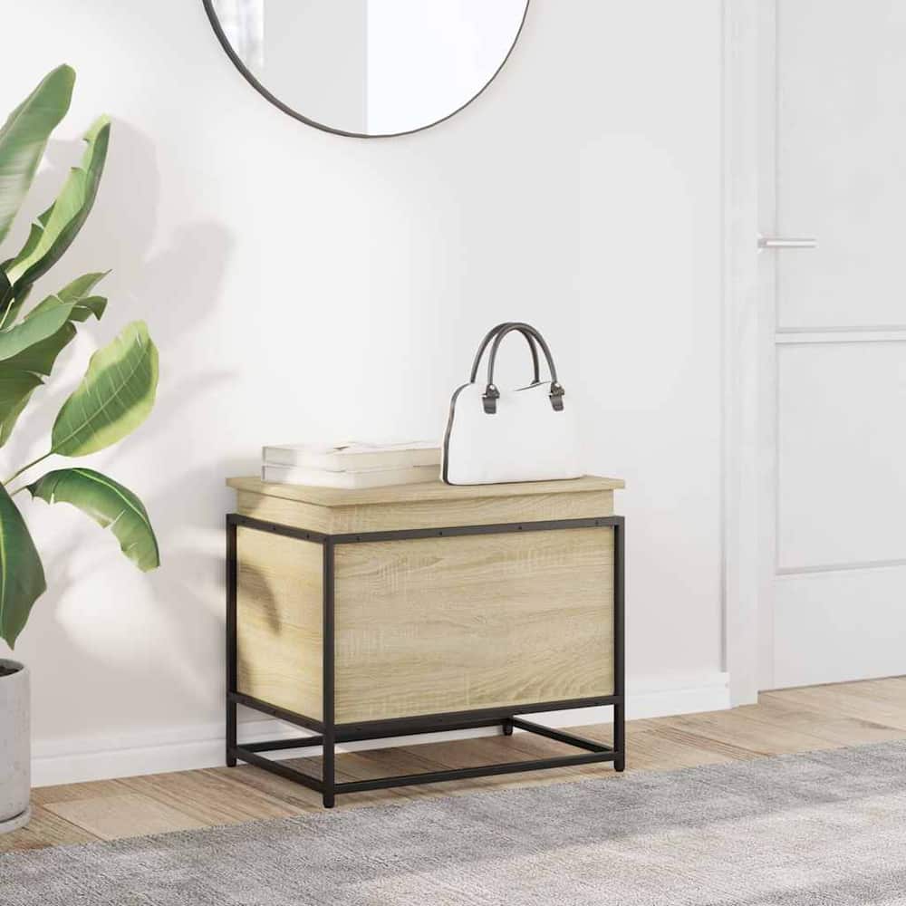 The storage box with lid is placed in a hallway next to a mirror and a plant
