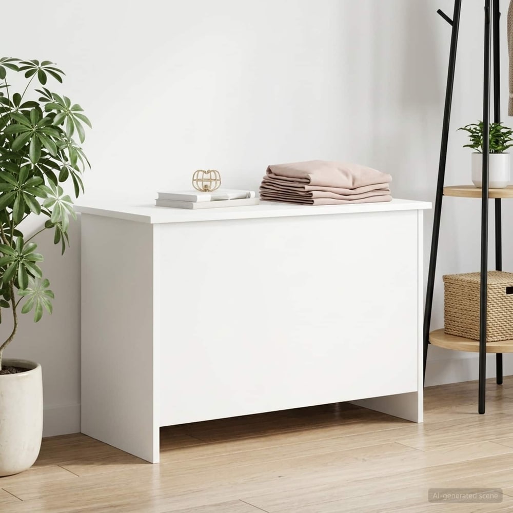 The white storage chest in a room setting with plants