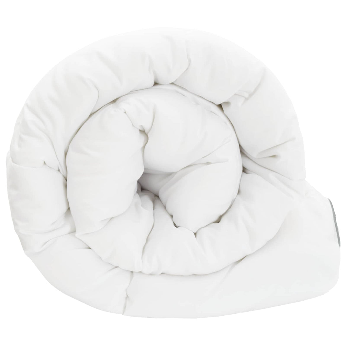 the white summer duvet coiled into a circular spiral shape