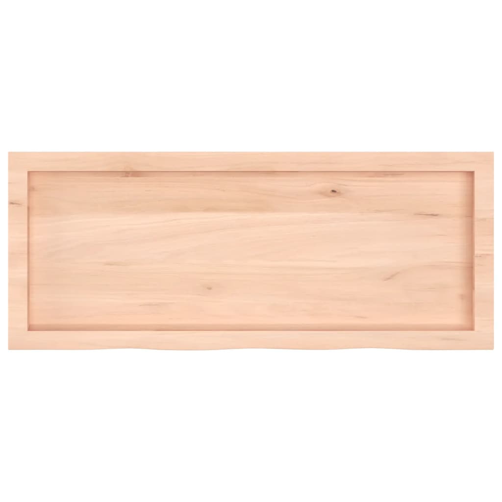 The table top seen from underneath showing the recessed frame construction and solid wood finish