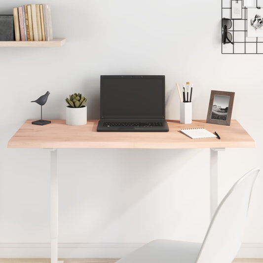 vidaXL Table Top Untreated Solid Wood Oak set up as a desk with a laptop and plant