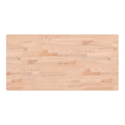 The rectangular solid wood beech table top showing its natural wood grain pattern