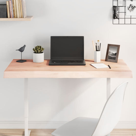 vidaXL Table Top Untreated Solid Wood Oak Live Edge set up as a desk with a laptop and accessories