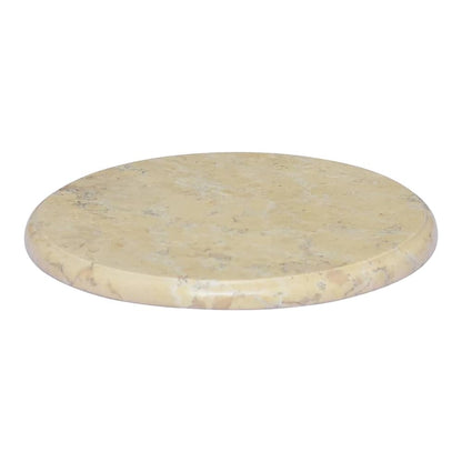 Close-up of the cream marble table top with a natural stone pattern