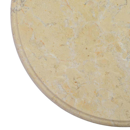 Detail of the edge of the cream marble table top showing the stone grain
