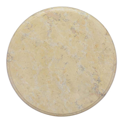 Top view of the round cream marble table top with a detailed stone texture