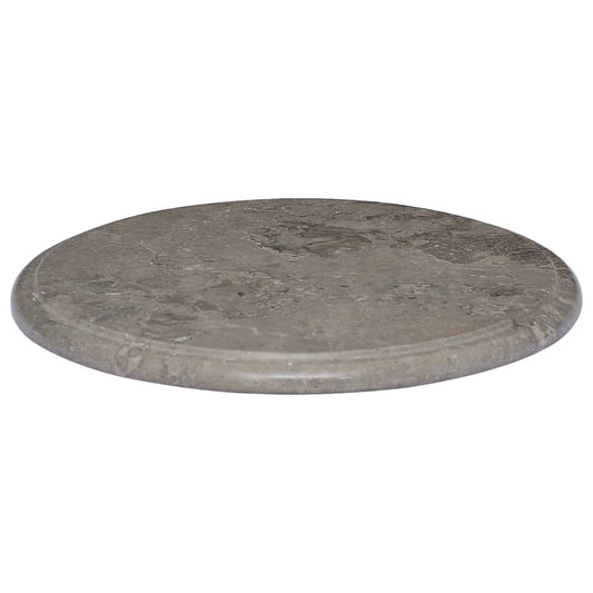 The round table top viewed from a high angle showing the grey stone texture