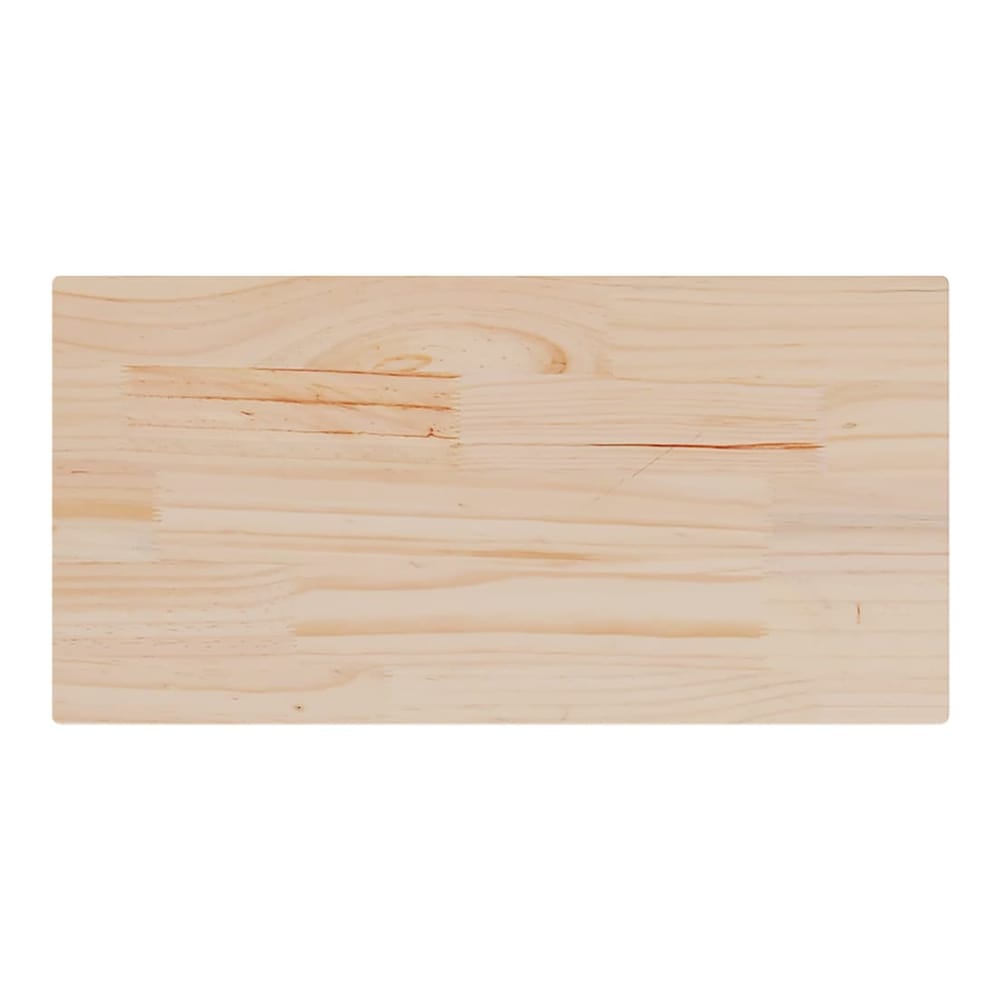 A single rectangular solid wood pine table top shown from above