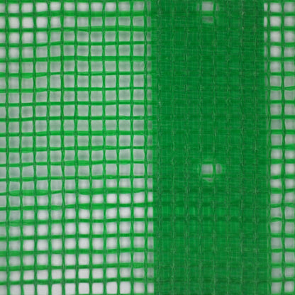close up of the green tarpaulin showing its woven structure