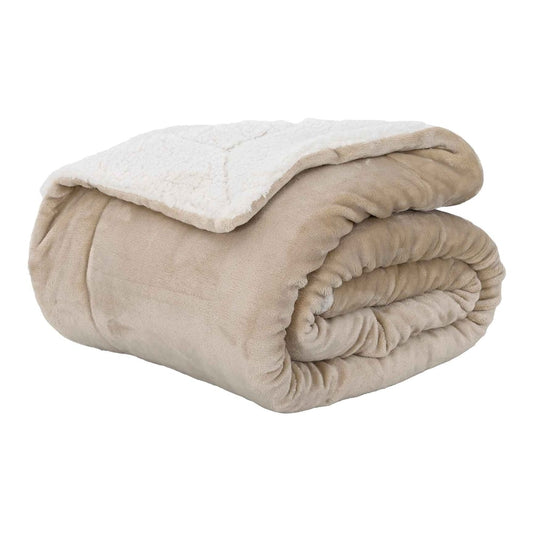 A beige fleece throw blanket folded neatly on a white surface