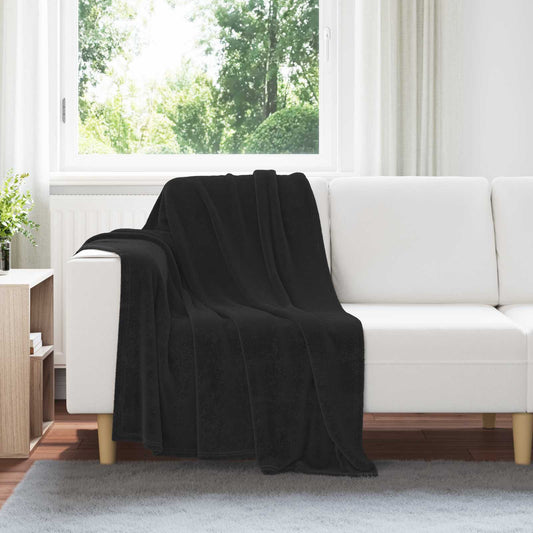 vidaXL Throw Blankets 6 pcs Black 3.04 kg Fleece draped over a white sofa