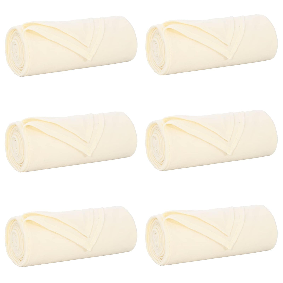Six cream fleece blankets rolled up and placed side by side