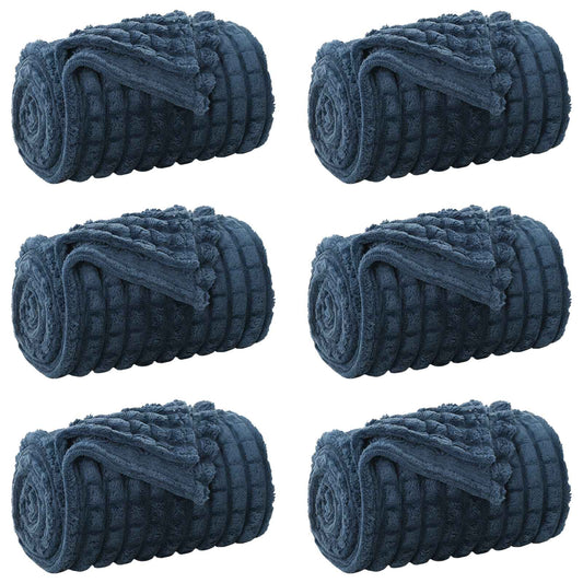 the fleece blankets arranged in a grid of six individual rolled items on a white background