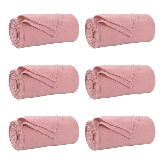 Six pink fleece blankets rolled up and arranged in two rows of three