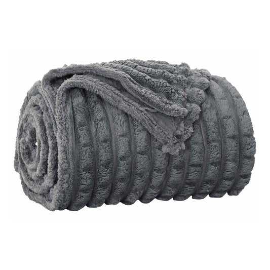 a dark grey fleece blanket rolled up