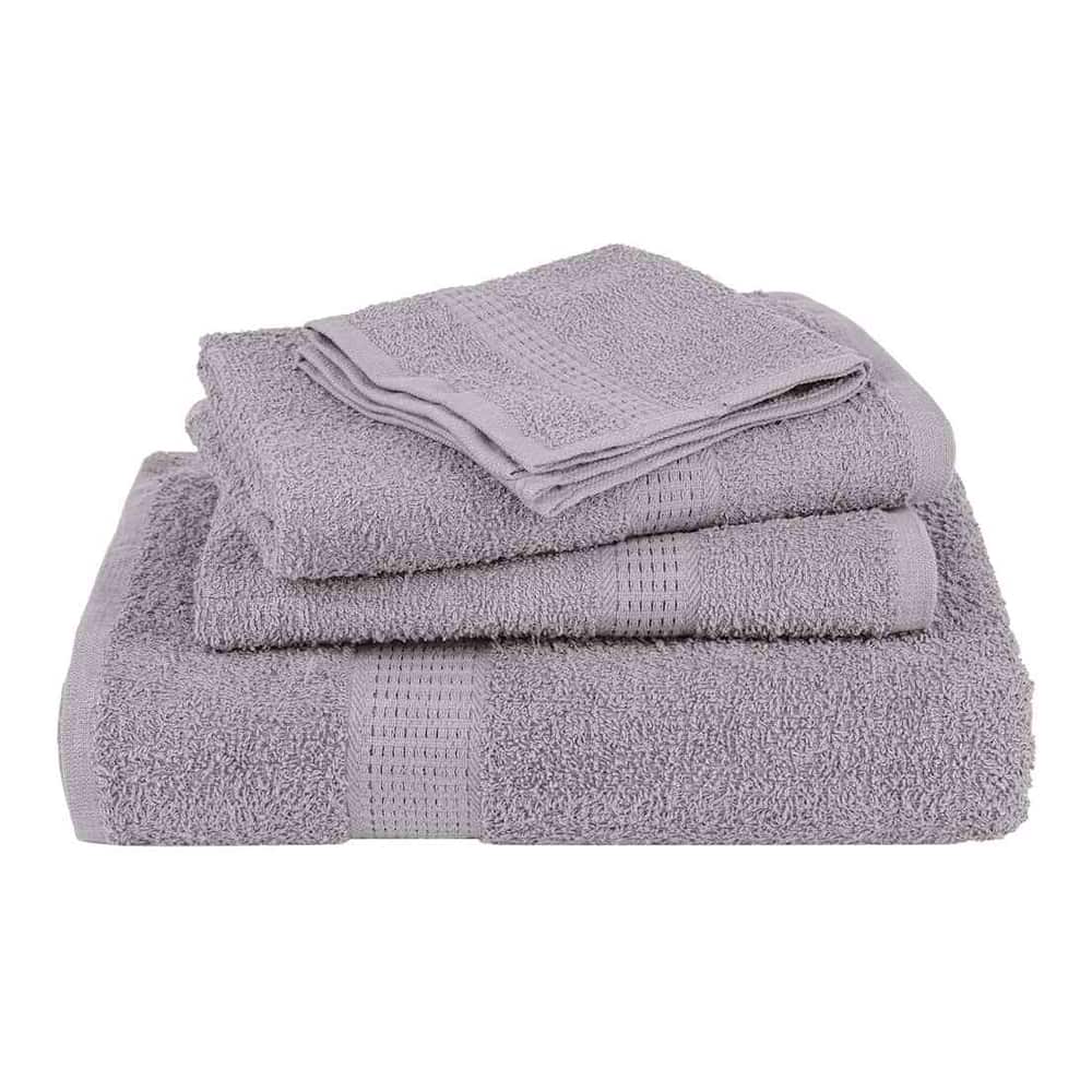 A pile of folded grey towels